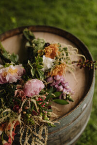 Flowers perk up our old barrels